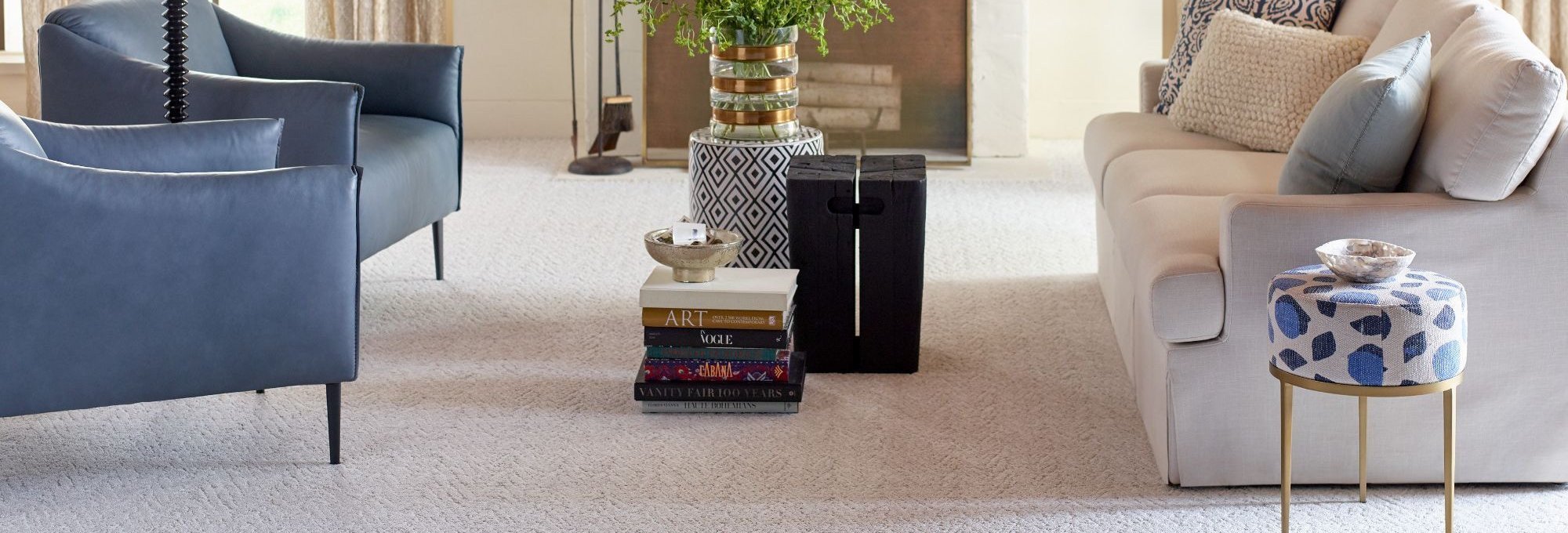 White couch and 2 blue armchairs on carpet floor - Floors2Interiors in TX