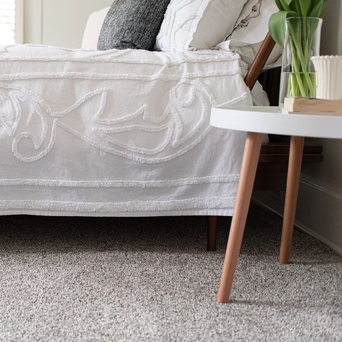 white bed and table on carpet - Floors2Interiors in TX